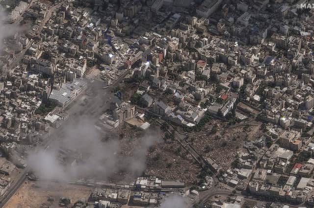 This image provided by Maxar Technologies on Wednesday, Oct. 18, 2023 shows an overview of al-Ahli Hospital after explosion in Gaza City.  (Satellite image ©2023 Maxar Technologies via AP)