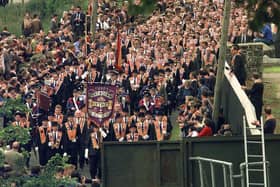 File photo dated 05/07/98 of members of the Orange Order from the Portadown District marching from Drumcree Church towards the barricade blocking their route along the nationalist Garvaghy Road. PA Wire/John Giles