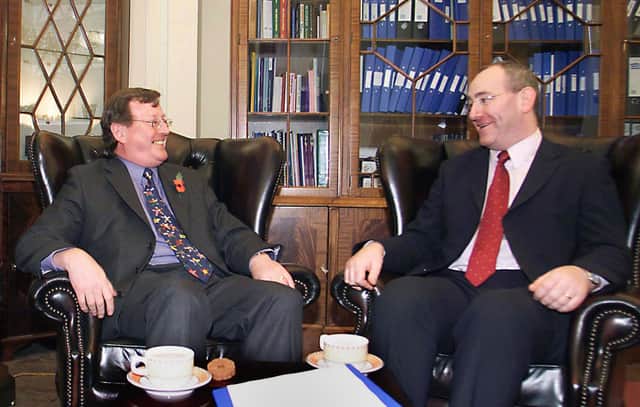 The then first minister David Trimble and deputy fist minister Mark Durkan relax with a coffee in the first minister’s office in November 2001 in Stormont. Mr Durkan says of the pre-agreement talks: “The UUP had taken confidence that they would not be facing a pan-nationalist front if they were the only main unionist party at the table” (Photo by Cathal McNaughton/Getty Images)
