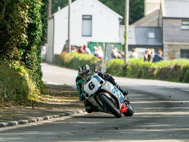 Michael Dunlop (Team Classic Suzuki) at Gorse Lea during the opening Classic Superbike practice session for the 2023 Manx Grand Prix.