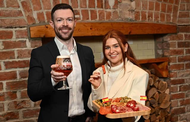 SALUD!  Matthew Fitzpatrick and Chloe Wright of United Wines celebrate the launch of Spain’s best-selling draught lager Cruzcampo in Northern Ireland. Available in draught, bottle and can formats, Cruzcampo originated in Sevilla more than 119 years ago and is one of Spain's most iconic and beloved beer brands, with a devoted following worldwide. Now Craigavon-based United Wines, one of the biggest drinks distributors on the island of Ireland, is giving the Northern Ireland public a chance to enjoy an authentic taste of Spain with the introduction of the country’s most popular draught beer. 