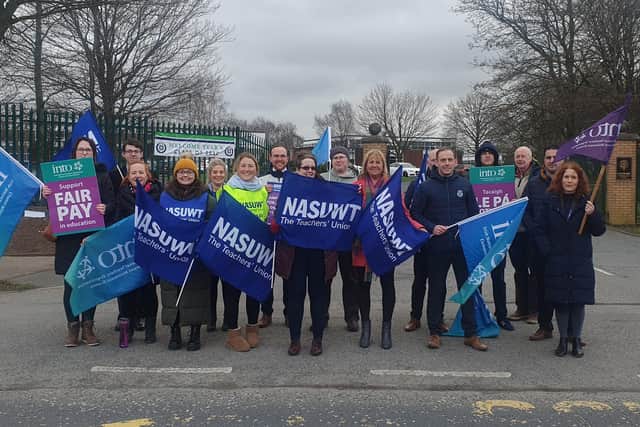 Members of the NASUWT and INTO on the picket line outside Lismore Comprehensive in Craigavon during a half-day strike on February 21 over pay and conditions