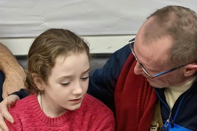 Irish-Israeli citizien Emily Hand, 9-years-old, was reunited with her father Thomas Hand on Saturday after being kidnapped by Hamas in Israel. Emily was one of the hostages Hamas released on Saturday, in the second round of swaps under a cease-fire deal. Photo: Family Handout/PA Wire