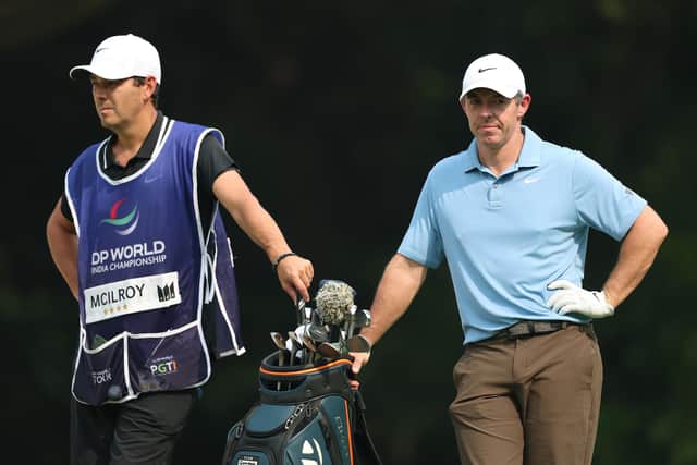 Rory McIlroy (right) and caddie Harry Diamond during the third round of play across the DP World India Championship at Delhi Golf Club. (Photo by Luke Walker/Getty images)