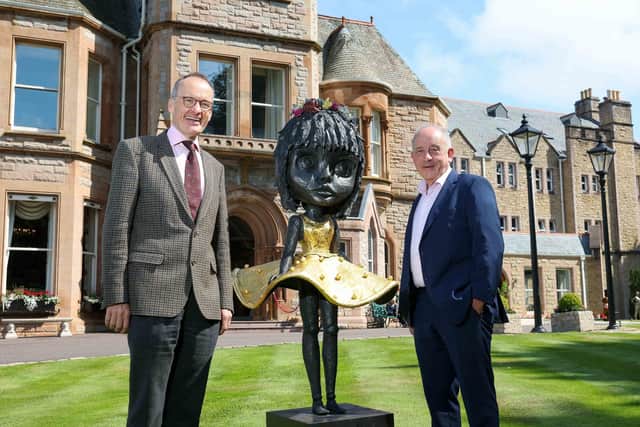 Howard Hastings (left), chairman of Hastings Hotels, and Oliver Gormley of Gormleys with Patrick O'Reilly’s Shayleigh which will feature at Ireland's biggest art and sculpture event, Art and Soul, hosted by Gormleys at the Culloden Estate and Spa in Belfast from August 19 - Sept 10