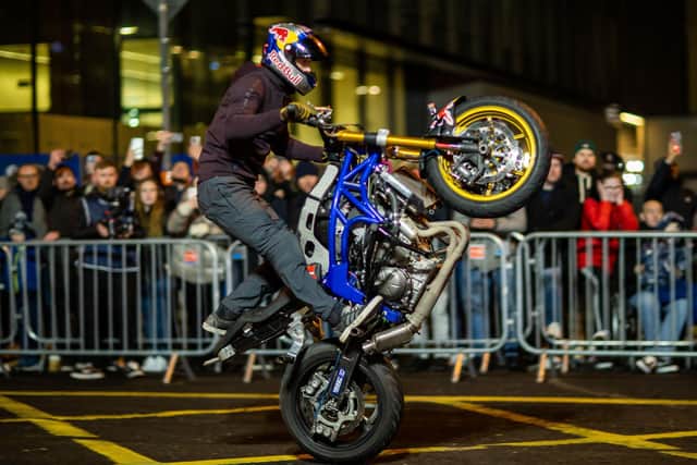 Red Bull Athlete and motorcycle stunt rider Mike Jensen in action at the Red Bull Showrun on North Wall Quay, Dublin. Picture: INPHO/Morgan Treacy