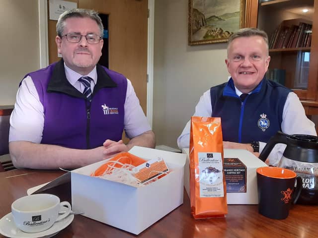 Jonathan Mattison, museum curator, and David Scott, services and outreach manager, with the new King William's Blend coffee gift set