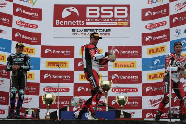 Glenn Irwin sprays the victory champagne after winning the final British Superbike race in the season-opener at Silverstone. Picture: David Yeomans Photography