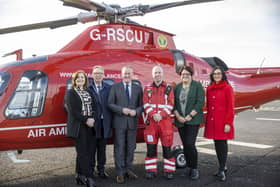 (Left-right) Breige Mulholland, Head of Finance and Chair Operations at Air Ambulance NI, Dr Gerard O'Hare, Chairman of Air Ambulance NI, Finance Minister Conor Murphy, Glenn O'Rorke Operation Lead at HEMS, Kate Beggs NI Director of The National Lottery Community Fund, and Kerry Anderson Head of Fundraising at Air Ambulance NI, during a Ministerial visit to Air Ambulance Northern Ireland in Lisburn. Photo: Liam McBurney/PA Wire