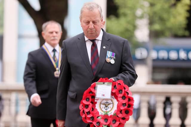 NI Veterans Commissioner Danny Kinahan laying a wreath at the Cenotaph at Belfast City Hall in 2022. Photo: Jonathan Porter/PressEye