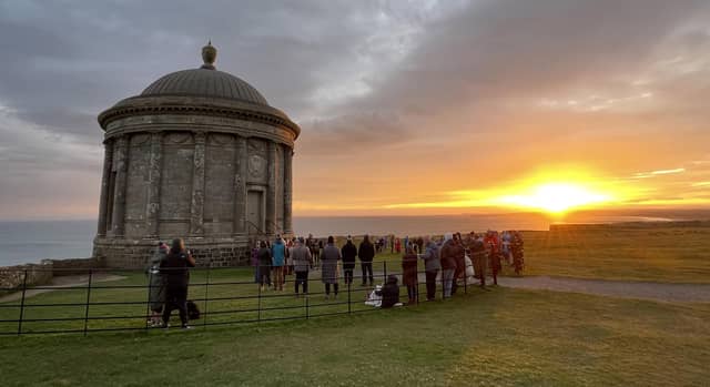 Worshippers gather for the Inter-church Dawn Service on Easter Sunday at Mussenden Temple, Downhill. Picture: Michael Cooper