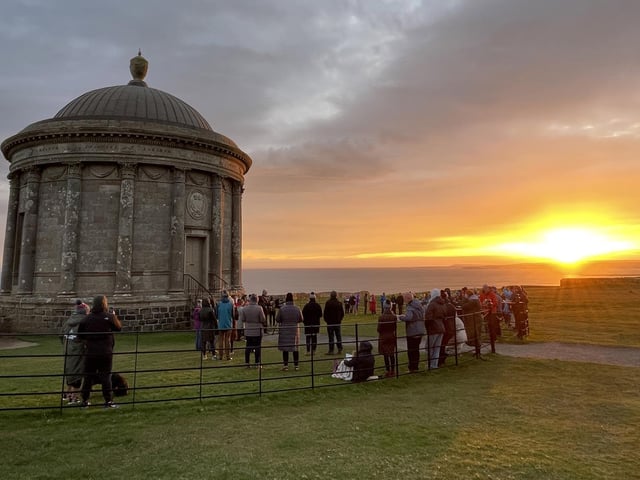 Worshippers gather for the Inter-church Dawn Service on Easter Sunday at Mussenden Temple, Downhill. Picture: Michael Cooper