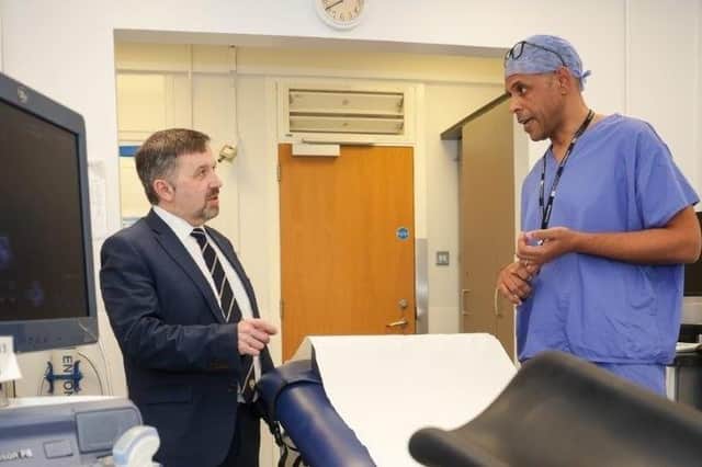 Health Minister Robin Swann with Dr Ishola Agbaje, Consultant Gynaecologist.