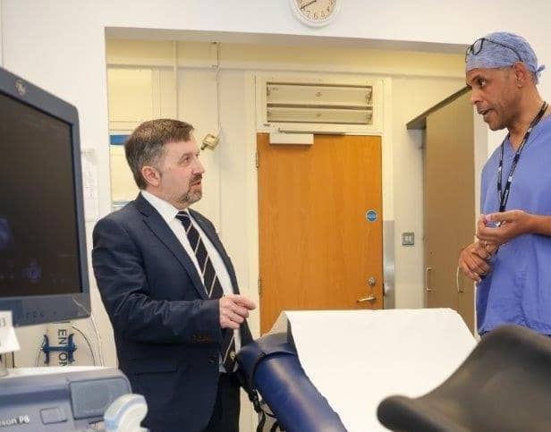 Health Minister Robin Swann with Dr Ishola Agbaje, Consultant Gynaecologist.