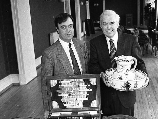 Pictured at the end of February 1992 are antique enthusiasts Caroll Falls and Sean McLaughlin who are seen dusting down some of the star attractions – Victorian cutlery and stoneware – which was on display at the antiques fair in Belfast Castle. Picture: News Letter archives