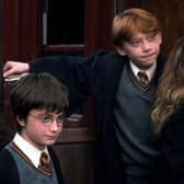 Daniel Radcliffe, Rupert Grint and Emma Watson in Harry Potter and the Philosopher's Stone (2001). All eight of the Harry Potter films based on the hugely popular children's fantasy books by JK Rowling are now avilable to watch on streaming service Netflix with the flick of a remote rather than a wand. Many fans on Twitter have announced a binge-watch of the box office-hit franchise is now in order. PIC: Warner Bros