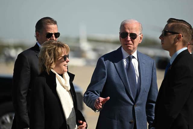 US President Joe Biden, with his sister Valerie Biden (2nd L, and son Hunter Biden (L), arrives to board Air Force One, as he departs for Northern Ireland, at Joint Base Andrews in Maryland on April 11, 2023. (Photo by Jim WATSON / AFP) (Photo by JIM WATSON/AFP via Getty Images)