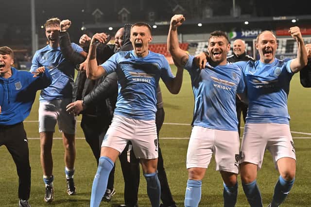 Ballymena United players celebrate last night's Samuel Gelston’s Whiskey Irish Cup semi-final success over Larne by 2-0 at Seaview