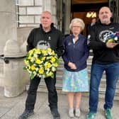 Julie Hambleton (centre), whose sister Maxine was killed in the Birmingham pub bombs, outside Belfast City Hall on Saturday with supporters of the families' campaign for justice Ian Williams from Preston (left) and Glenn Randall from London (right) who completed a walk from Birmingham to Belfast to raise awareness and also funds to support a potential legal challenge against the bill. Photo: David Young/PA Wire