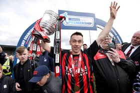 Paul Heatley celebrates winning the 2015/16 Premiership title with Crusaders - one of three league titles he picked up at Seaview. PIC: Stephen Hamilton