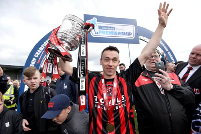 Paul Heatley celebrates winning the 2015/16 Premiership title with Crusaders - one of three league titles he picked up at Seaview. PIC: Stephen Hamilton