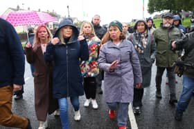 First Minister Michelle O'Neill (centre left) and Sinn Fein president Mary Lou McDonald (centre right) at the Garvaghy road ahead of a Portadown District Loyal Orange Lodge (LOL) No 1 march in the first parade along the Garvaghy Road in Portadown for almost 30 years, after the parade was given clearance in a late-night hearing. Pic: Peter Morrison/PA Wire