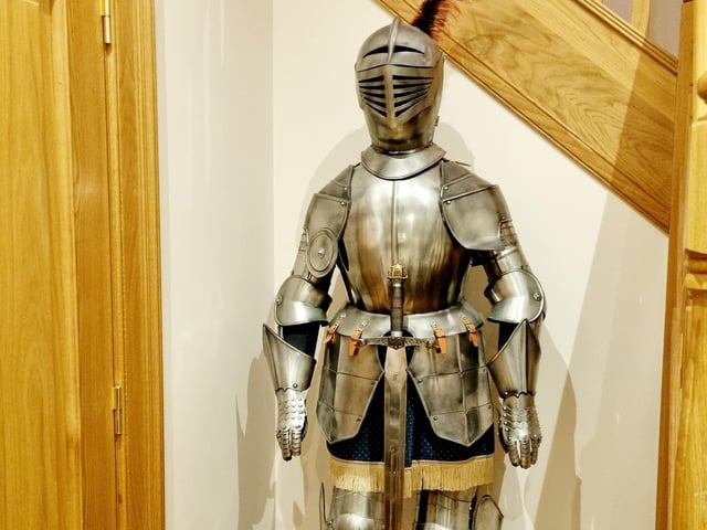 The castle apartment comes complete with plenty of quirky design touches - including this suit of armour.
