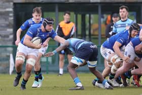 Tom Brigg on the attack for Queen's against Barnhall at the Dub last year. (Photo by Pacemaker Press)