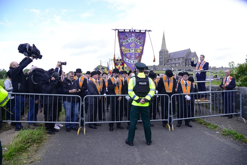 Orangemen are stopped at the police barricade at Drumcree
