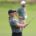 Northern Ireland's Rory McIlroy watches his shot on the third hole during the first round of The Cognizant Classic at PGA National in Florida