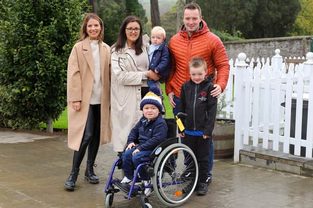 Anna Corry of Blossomingbirds is pictured with Andrene and Graham Rennie of The Big C Foundation, sons Zak (one) and Lewis (six), and Jack McClenaghan (three) as the families join forces to drive a fundraising campaign to purchase wheelchairs to help children living with cancer. The initiative is in honour of Andrene and Graham’s three year old son Callum who passed away in May.