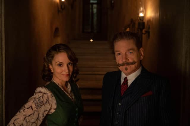 Tina Fey as Ariadne Oliver and Kenneth Branagh as Hercule Poirot in A Haunting In Venice.  PA Photo.