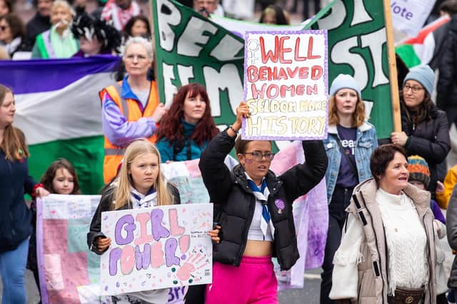 An International Women’s Day Rally attracted hundreds of people who walked from Writer's Square to Belfast City Hall