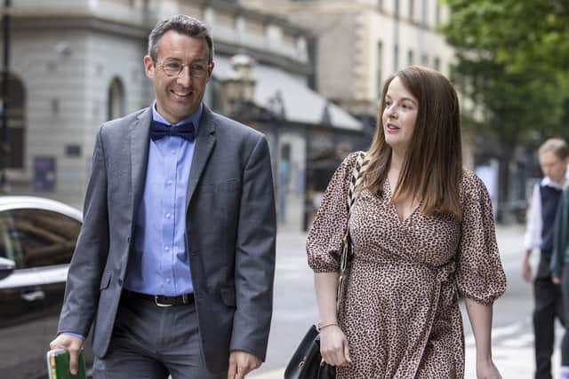 Andrew Muir and Nuala McAllister of the Alliance party arriving at the Grand Central Hotel in Belfast for a meeting with Tanaiste Micheal Martin