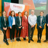 firmus energy representatives pictured with Thornhill College staff and pupils