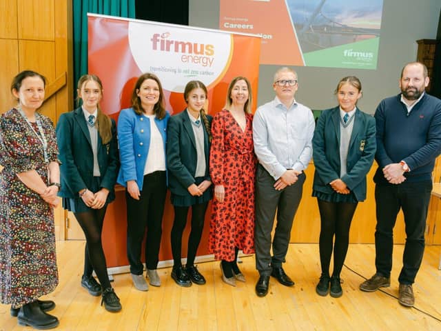 firmus energy representatives pictured with Thornhill College staff and pupils