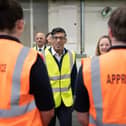 Prime Minister Rishi Sunak meets apprentices and staff during a visit to the Caterpillar factory in Peterborough, Cambridgeshire. Picture date: Wednesday April 5, 2023. Photo credit: Stefan Rousseau/PA Wire
