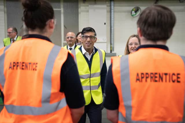 Prime Minister Rishi Sunak meets apprentices and staff during a visit to the Caterpillar factory in Peterborough, Cambridgeshire. Picture date: Wednesday April 5, 2023. Photo credit: Stefan Rousseau/PA Wire
