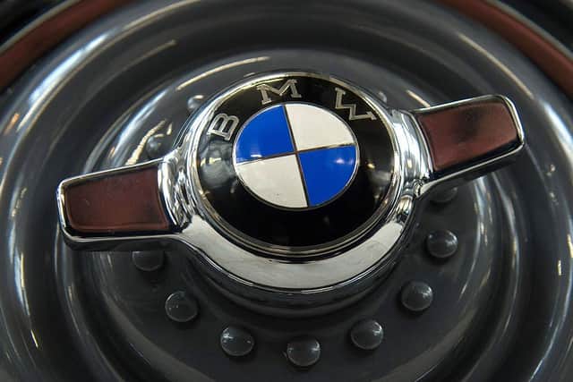 A vintage logo of German automaker BMW on a wheel cap