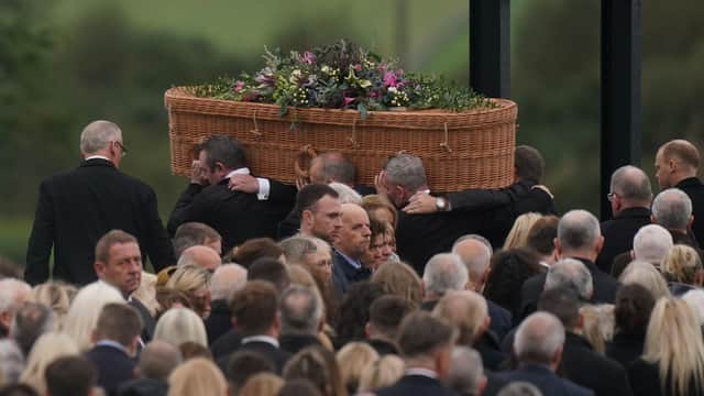 The coffin of Jessica Gallagher, 24, is carried into St Michael's Church, Creeslough, for her funeral mass.