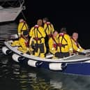 The crew launching from Portrush quayside to go out to their Severn-class lifeboat in the middle of the night