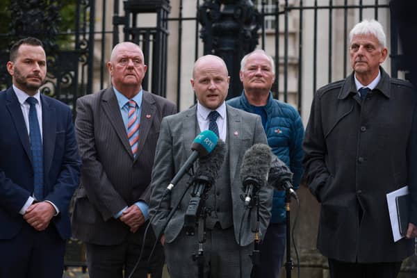 Legal representative for Portadown District Lodge 101 and loyalist spokesperson, Jamie Bryson, speaking to the media, with Timothy Gaston MLA (left), outside Belfast High Court. A judgment is expected to be handed down later following a legal challenge to the decision by Secretary of State Sir Chris Bryant to ban the Drumcree Orange Order parade in Portadown.