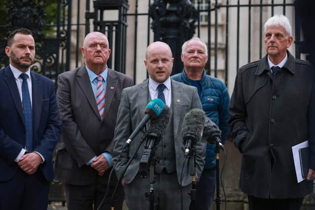 Legal representative for Portadown District Lodge 101 and loyalist spokesperson, Jamie Bryson, speaking to the media, with Timothy Gaston MLA (left), outside Belfast High Court. A judgment is expected to be handed down later following a legal challenge to the decision by Secretary of State Sir Chris Bryant to ban the Drumcree Orange Order parade in Portadown.