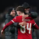 Liverpool manager Jurgen Klopp embraces Northern Ireland star Conor Bradley following the Carabo Cup semi-final clash with Fulham