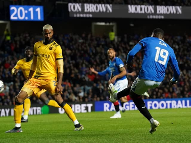 Rangers' Abdallah Sima scores his side's opening goal of the game against Livingston in the Viaplay Cup quarter-final match at Ibrox