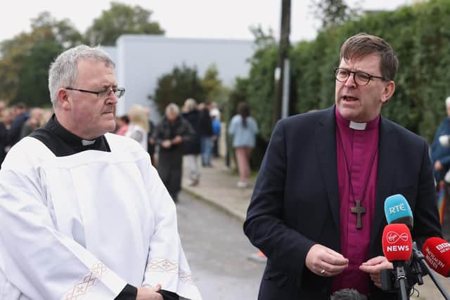 Rev John Joe Duffy (left) and Church of Ireland, Right Reverend Andrew James Forster,Bishop of Derry and Raphoe, speaking at a commemoration and remembrance service in Creeslough, Co Donegal on the first anniversary of the explosion at a service station which killed 10 people.