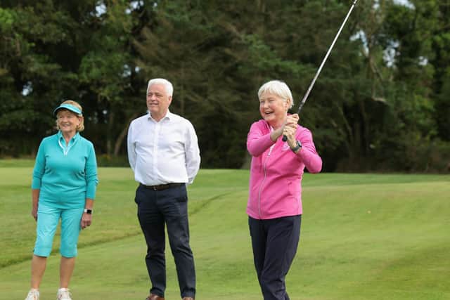 Pictured with Valerie (centre) is head of BHF NI Fearghal McKinney and fellow Donaghadee Golf Club member and friend Jill Heron