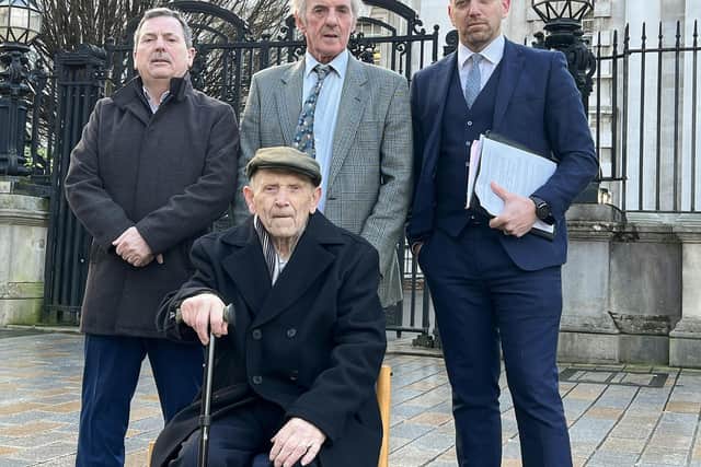 ‘Significant damages’: Bobby Clarke, John Teggart, Joseph Millen and solicitor Padraig O Muirigh pictured outside Belfast High Court
