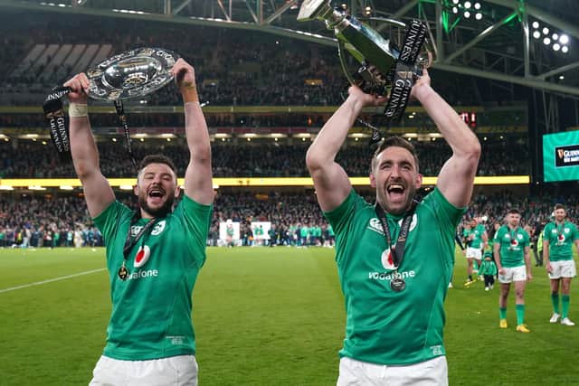 Ireland's Robbie Henshaw and Jack Conan celebrate with the trophy after the Guinness Six Nations win over England