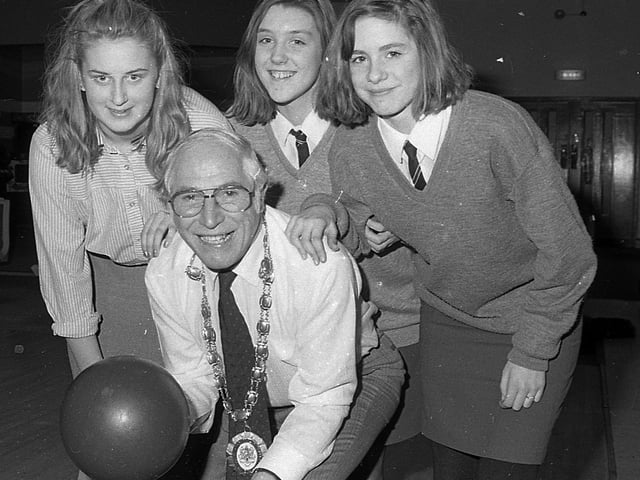 Castlereagh Mayor Ernest Anderson gets some cross-border advice on bowling in February 1992 from Mairead O’Grady from Cork and Sharon Meaney and Donna Young from Knockbreda High School during their joint day out at Dundonald Icebowl as part of an Organisation for Economic Cooperation and Development project. Picture: News Letter archives